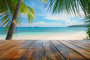 A wooden table on a tropical beach with palm trees and the ocean in the background. photo