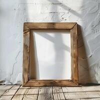 Rustic wooden frame mockup on whitewashed brick wall. photo