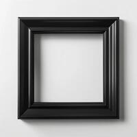 Black wooden frame isolated on white background. photo