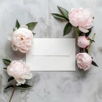 Exquisite peony flowers frame a blank note waiting for your message. photo