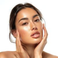 Closeup portrait of a beautiful young woman with flawless glowing skin. photo