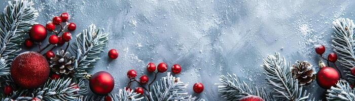 A close-up top view of fir branches covered in fresh snow, red ornaments nestled among them, focus on the contrast of colors, set against a muted, contemporary background, providin photo