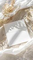 white blank notice invitation paper on a table photo