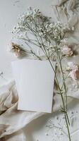 a wedding card lying on a modern nordic minimalistic desk photo