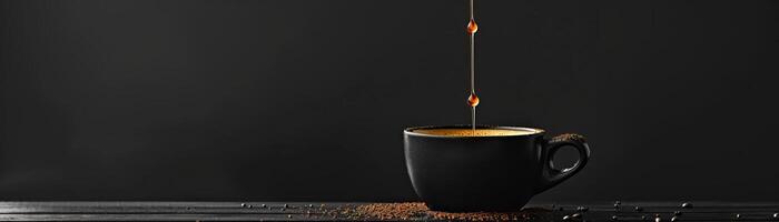 A monochromatic theme with coffee dripping into an elegant black cup, the drips highlighted against a matte black background, broad space on the left for minimalist text. photo