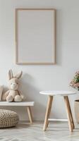 blank wooden picture frame on a white wall in a kids playroom neutral colors photo