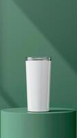 Closeup of a white color 20oz Straight Skinny Tumbler includes lid on a podium with green background, product mockup photo