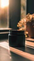 macro scene in which a black cosmetics jar lies on the surface photo