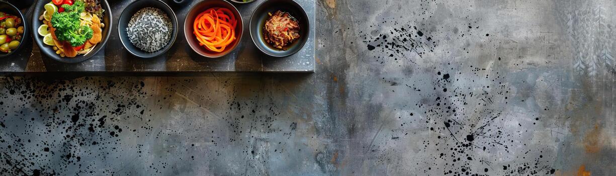 A contemporary setup of Thai finger foods neatly arranged on a polished concrete slab, ambient light accentuating the textures and colors, ample space above for minimalist text. photo
