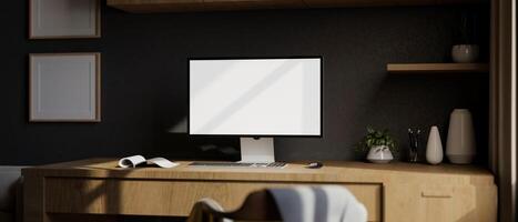 A modern home office with a white-screen computer mockup on a wooden desk against the black wall. photo