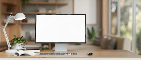 A modern and comfortable CEO's office or home office with a computer mockup on a wooden table. photo