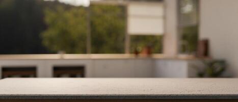 A tabletop with empty space for display product in a minimal domestic kitchen. photo