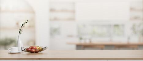 A wooden tabletop with a copy space with a blurred background of a modern Scandinavian kitchen. photo