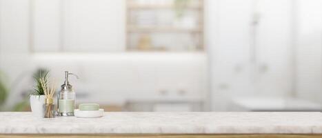 A shower gel bottle, a soap, an aroma diffuser, and copy space on a tabletop in a modern bathroom. photo