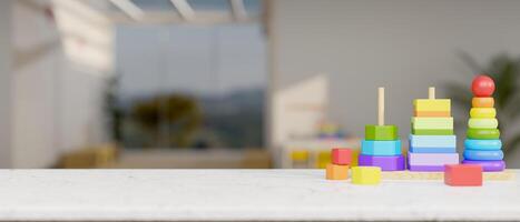 Colorful kid toys on a white table with a blurred background of a modern living room or class room. photo