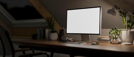Contemporary minimalist home office workspace in the attic room at night features a computer mockup photo