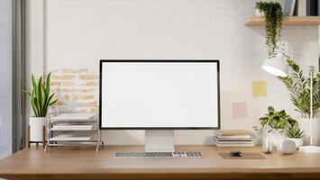 A contemporary minimalist home office features a computer mockup against a white rustic brick wall. photo