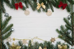 Christmas fir tree with decoration and glitters on wooden background. Christmas background on the white wooden desk photo