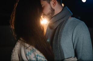 Date lovers in winter rink skates. Concept of Christmas holidays, caring for your loved one. photo