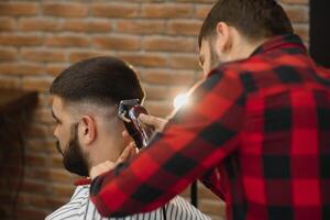 Men's haircut at the barber scissors photo