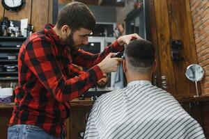 Men's haircut at the barber scissors photo