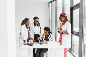 African-American black doctor woman and medical group photo