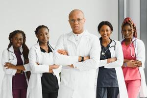 African-American black doctor woman and medical group. photo