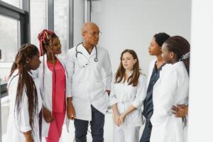 group of professionals medical workers working together. photo