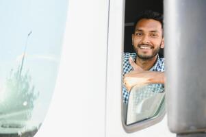 Portrait of a indian truck driver. photo