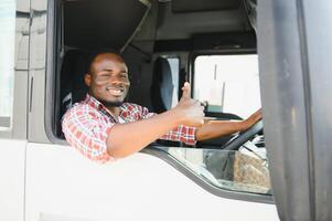 Courier Delivery. Black Man Driver Driving Delivery Car photo