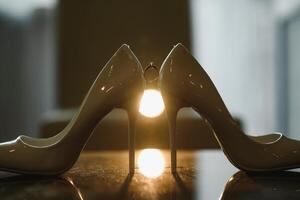 Wedding rings and high heels photo
