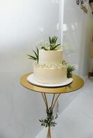 Elegant wedding cake with flowers and succulents. photo