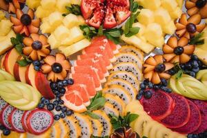 various dessert with fresh fruit on buffet line, sweet. photo