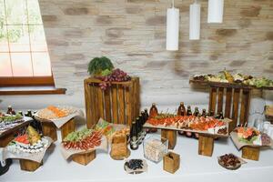 various dessert with fresh fruit on buffet line, sweet. photo