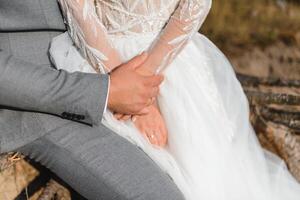 Hands of the bride and groom close-up. photo