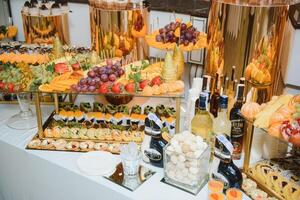 various dessert with fresh fruit on buffet line, sweet. photo