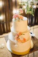 Elegant wedding cake with flowers and succulents. photo