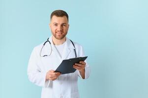 closeup of showing a tablet holding in hands by a male doctor who has a pretty smiley photo