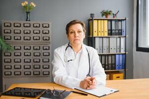 Portrait of woman doctor in hospital photo