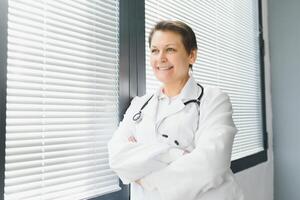 Portrait of woman doctor in hospital photo