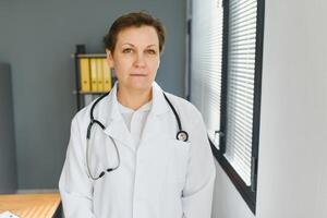 Portrait of woman doctor in hospital photo