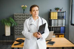 Portrait of woman doctor in hospital photo