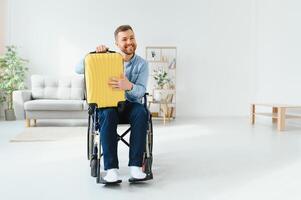 Young disabled man preparing for summer vacation photo