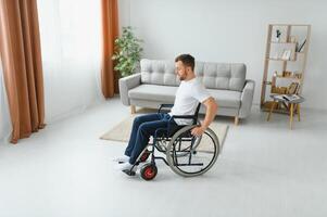 Young handsome man in wheelchair photo