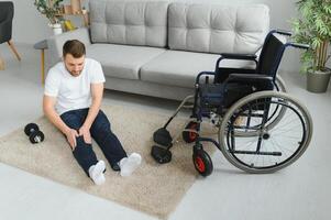 Disabled man recovering from injury at home photo