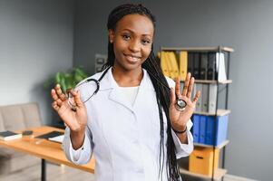 Portrait of woman medical doctor in hospital photo