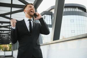 Businessman exulting for his success photo