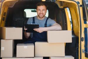 delivery service employee. Portrait of man working in delivery service photo