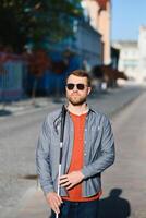 Close-up Of A Blind Man Standing With White Stick On Street photo