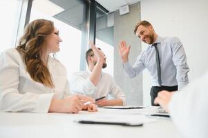 Group of young people in business meeting photo